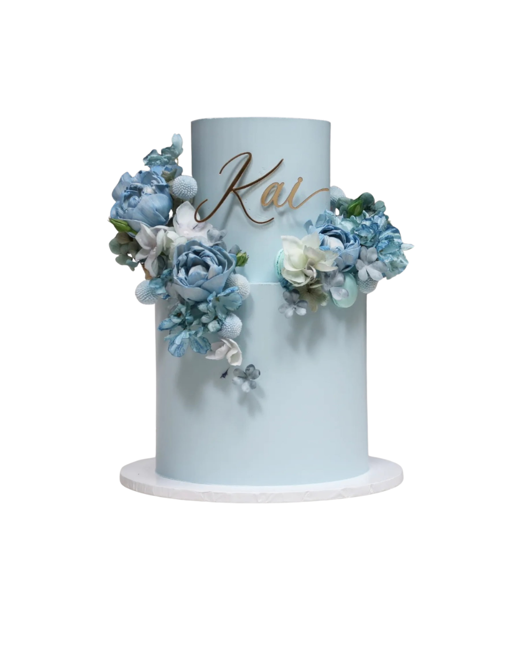 Two-tier dusty blue cake with blue florals and gold name topper