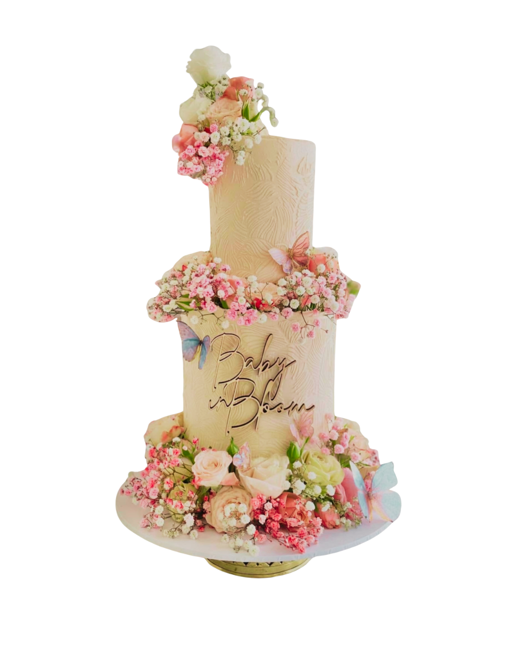 Two-tier baby shower cake with pink florals and butterflies